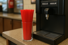 Load image into Gallery viewer, now put them next to a gas station coffee machine in a straw and stirrer holder

